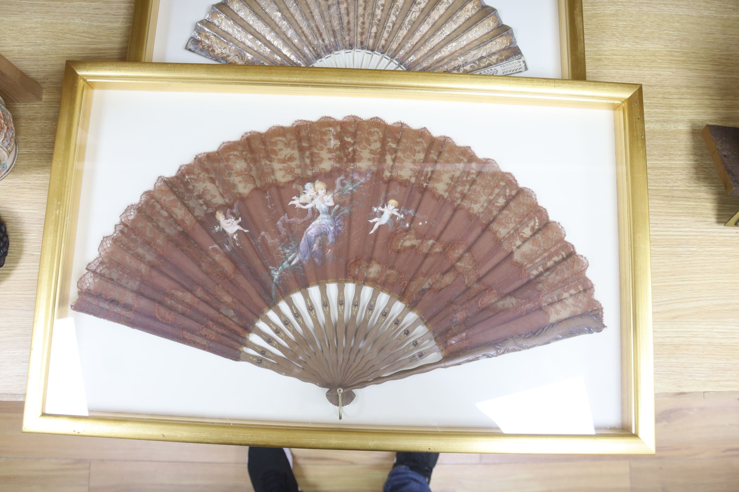 Two 19th century lace edged hand painted fans and a gilt and ivory fan, in 3 cases, largest case 42 x 67 cm